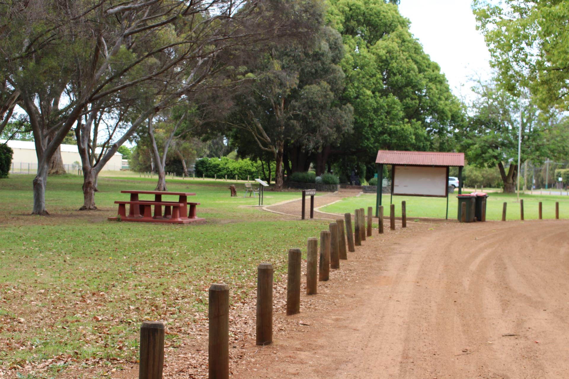 road with sign and picnic area